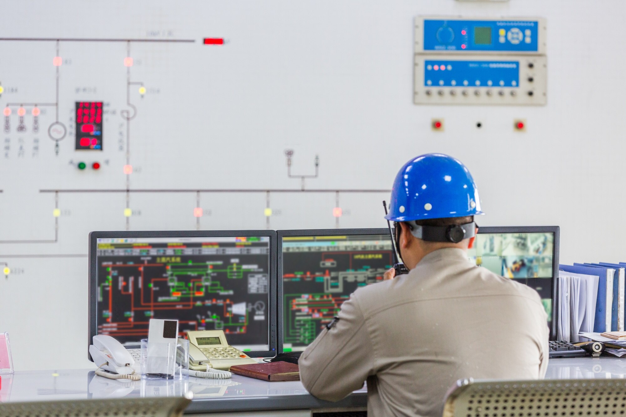 Operators monitoring a grid control room